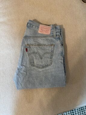 Levi's Light Wash Jeans with Pink Leather Patch